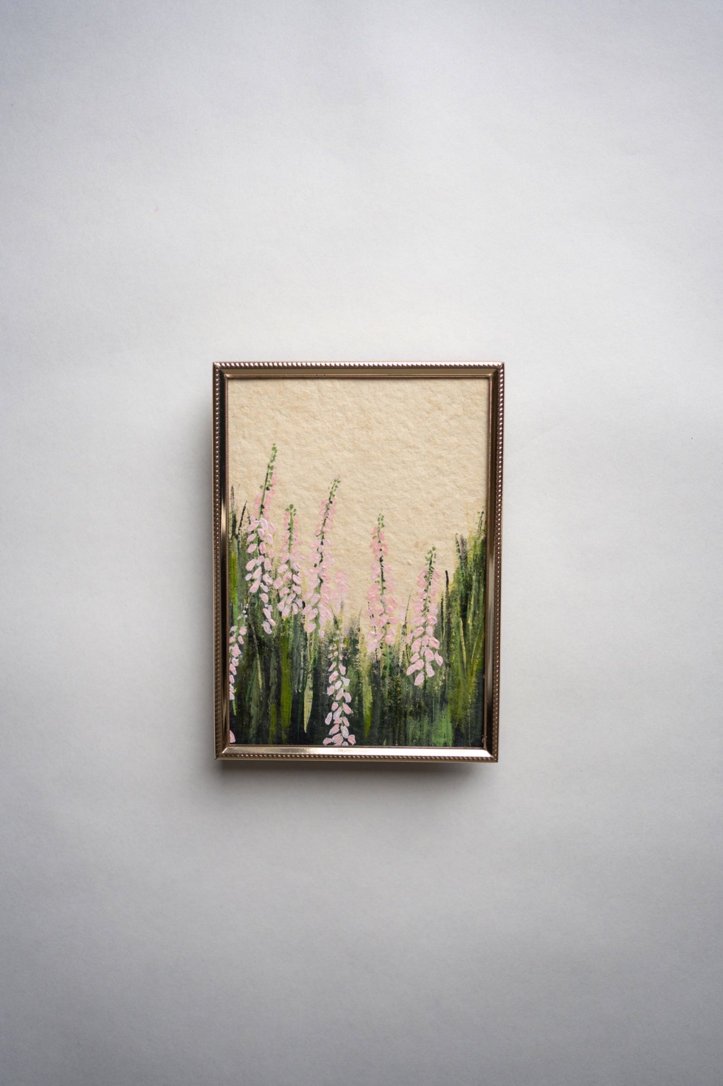 snapdragons in vintage frame